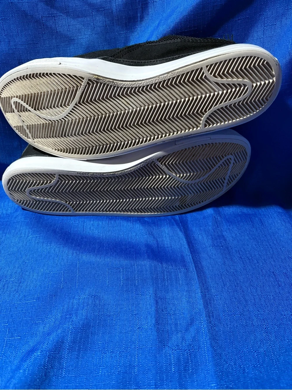 Nike Black Slip-On Canvas Sneakers with White Swoosh